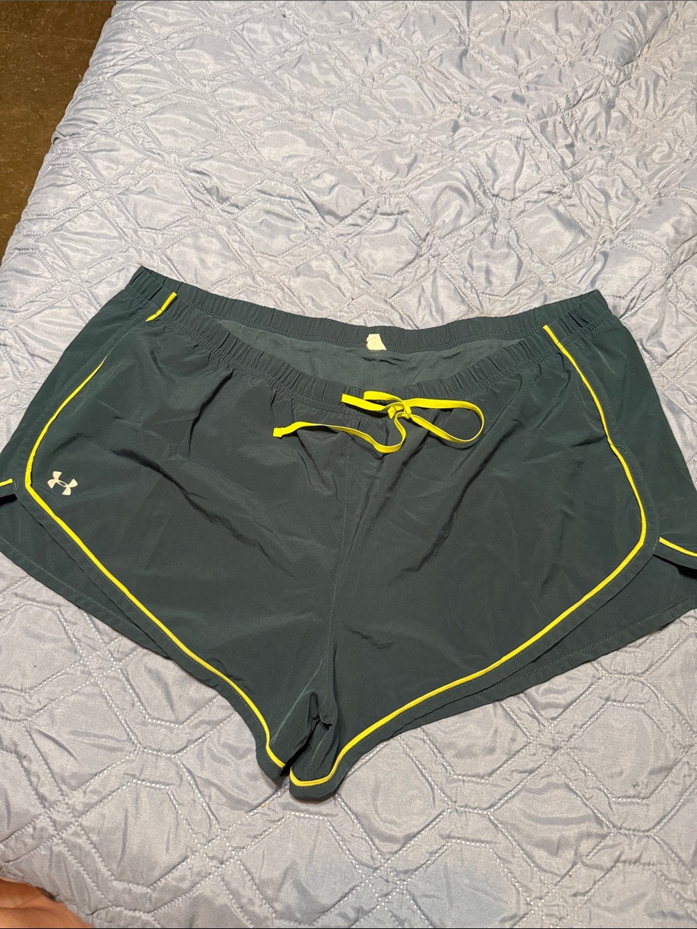 Under Armour Women's dark green Shorts with lime green Piping